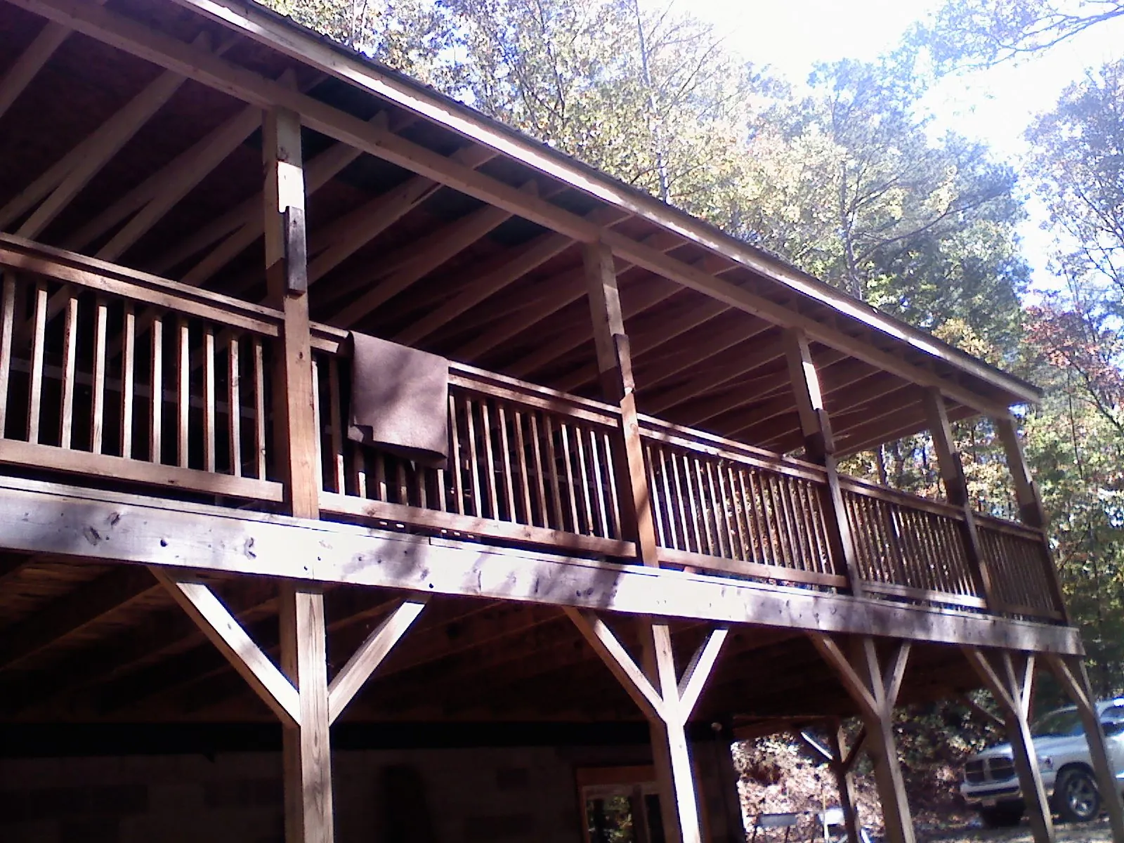 Timber framing under a new elevated porch and deck — Roof Leak Repair in Boaz by Roofing Brothers